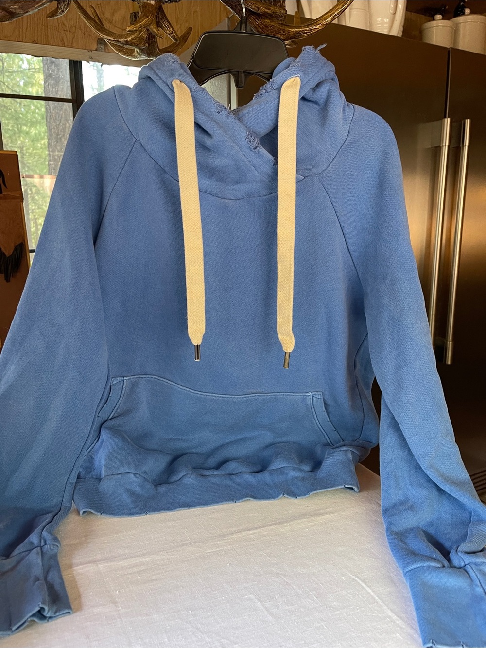 NSF blue distressed hoodie. Size medium